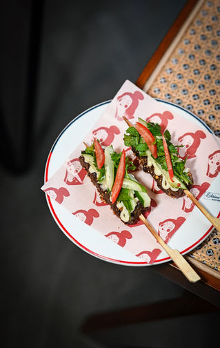 Charcoal Beef Skewers with Thai Cucumber Salad at BON Patong, featuring premium grilled beef and refreshing Thai flavors in Phuket.