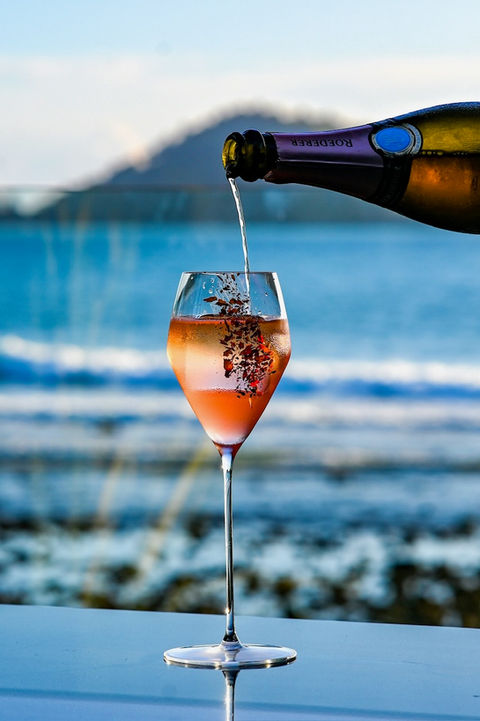 Rooftop cocktail with panoramic ocean views at L’Arôme by the Sea Phuket
