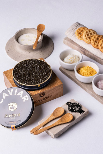 A beautifully plated Oscietra Caviar dish at L’Arôme by the Sea, featuring delicate pearls of caviar paired with fine ingredients, set against the backdrop of Phuket’s stunning ocean views.