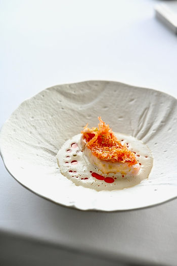 Delicately plated fish dish with ocean-inspired flavors at L’Arôme by the Sea Phuket
