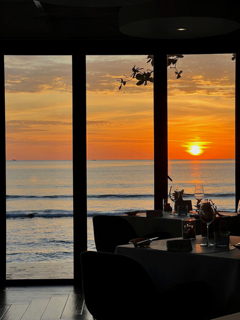 Stunning sunset view over the Andaman Sea from L’Arôme by the Sea, a fine dining restaurant in Phuket