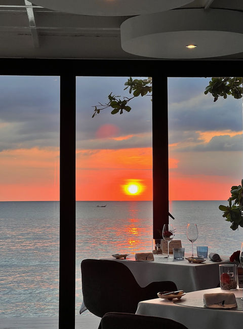 Golden sunset over the Andaman Sea, seen from L’Arôme by the Sea in Phuket