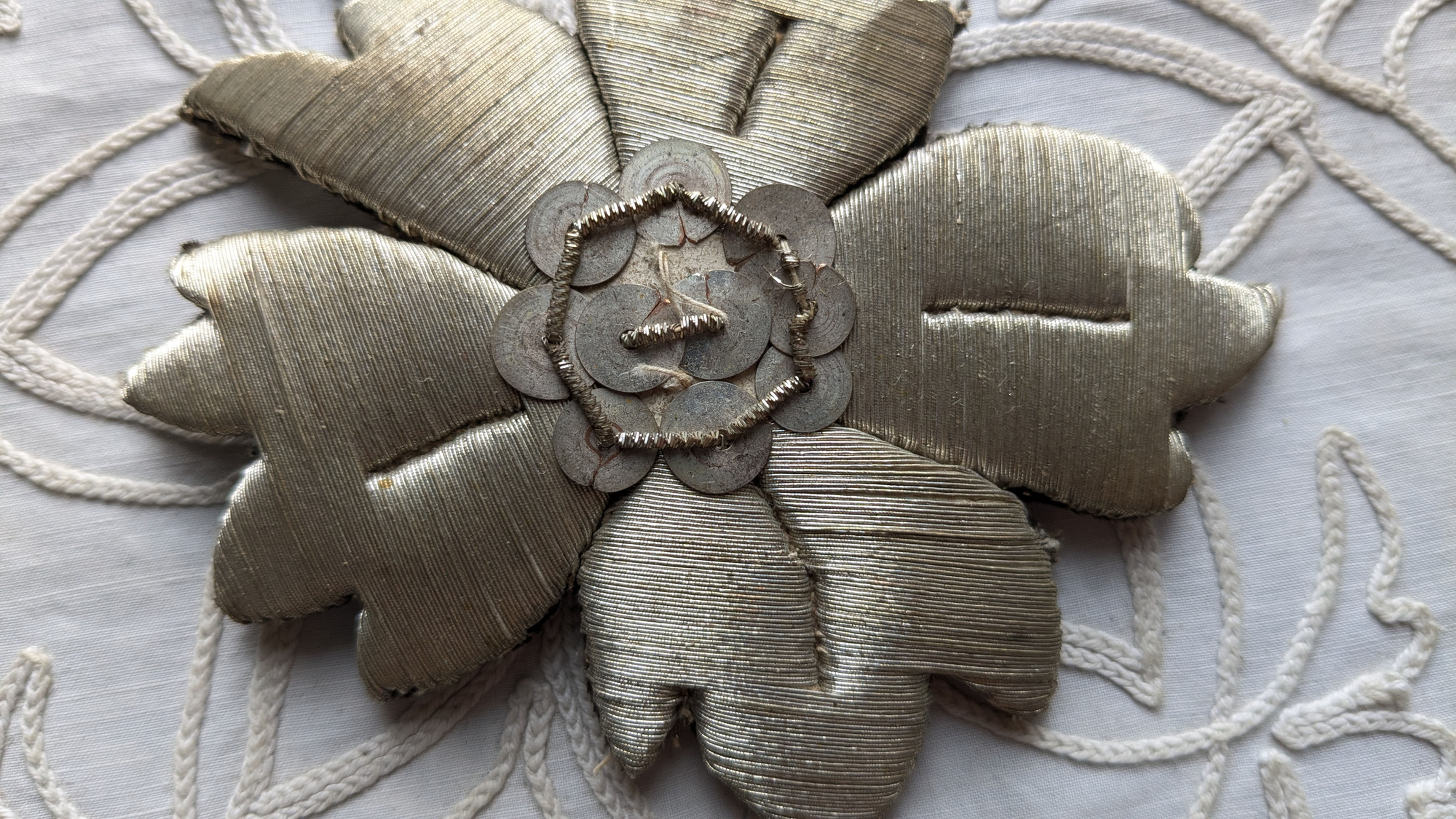 A 19th Century French Silver Metallic Ecclesiastical Embroid Depicting a Blossom