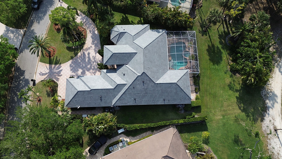 Aerial view of a gray metal roof by Ranger Roofing.