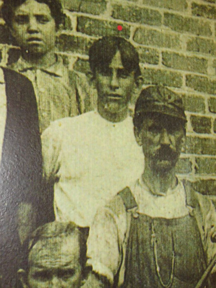 A photo of Joe Jackson as a boy working in a factory