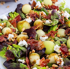Galia-Melon-Salad-with-Crisp-Prosciutto-and-Pine-Nuts-served.jpg