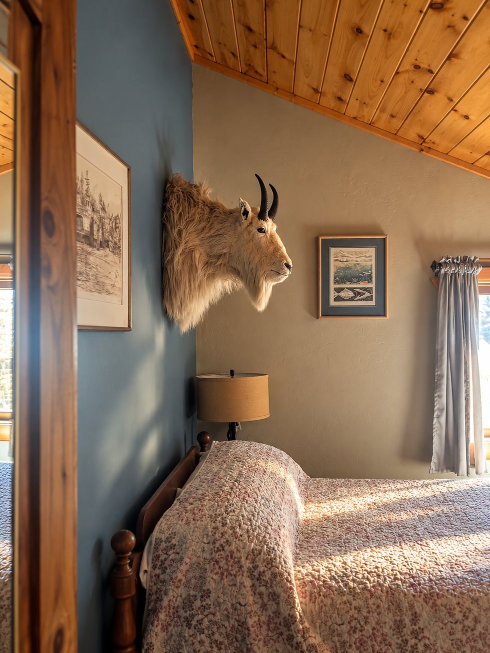 Rustic Cabin Bedroom with Mountain Goat Mount.png