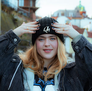 JULIET wearing QH x JULES Beanie with new music Take It on QH Sound