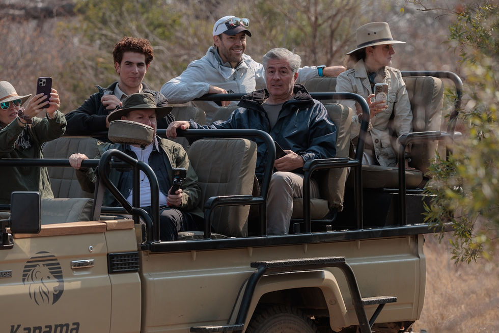 Guest driving in a game drive vehicle on safari at Kapama
