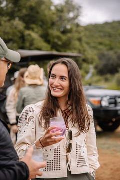 women listening to a conversation in the bush on safari