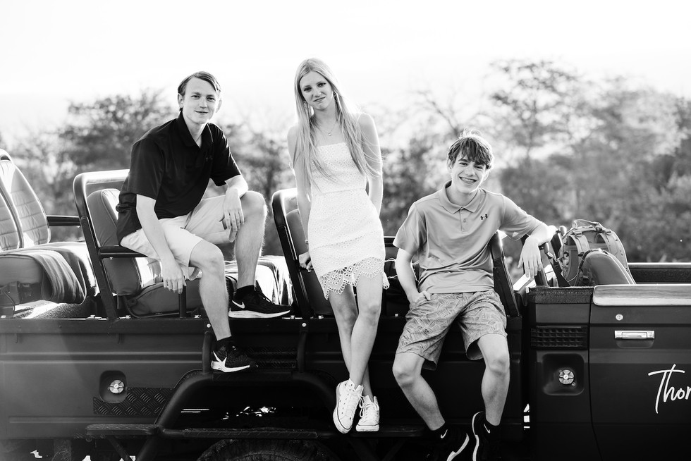 Children safari Portrait on a game drive vehicle at Thornybush Game Reserve