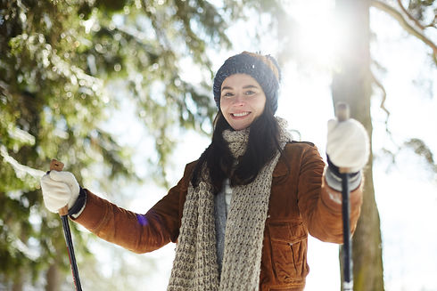 Girl enjoying snow in Lakeville MN, relieved from herniated disc pain with chiropractic care for a stronger, pain-free back.