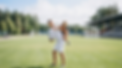 Father holding child with soccer ball in park, enjoying outdoor play in Lakeville MN, representing family wellness, energy, and active lifestyle