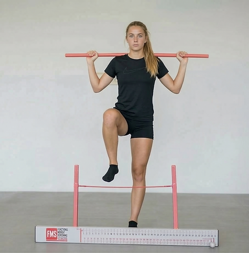 high school athlete performing functional movement screening Lakeville MN chiropractor sports medicine clinic