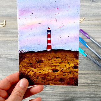 Reiseinspirierte Grußkarte mit Leuchtturm an der Nordsee als besondere Aufmerksamkeit