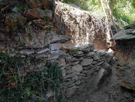 Rebuilding the collapsed dry-stone terrace wall
