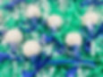 Golf ball treats wrapped with blue ribbons