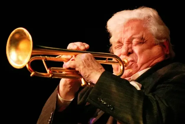 how do trumpet players play so high