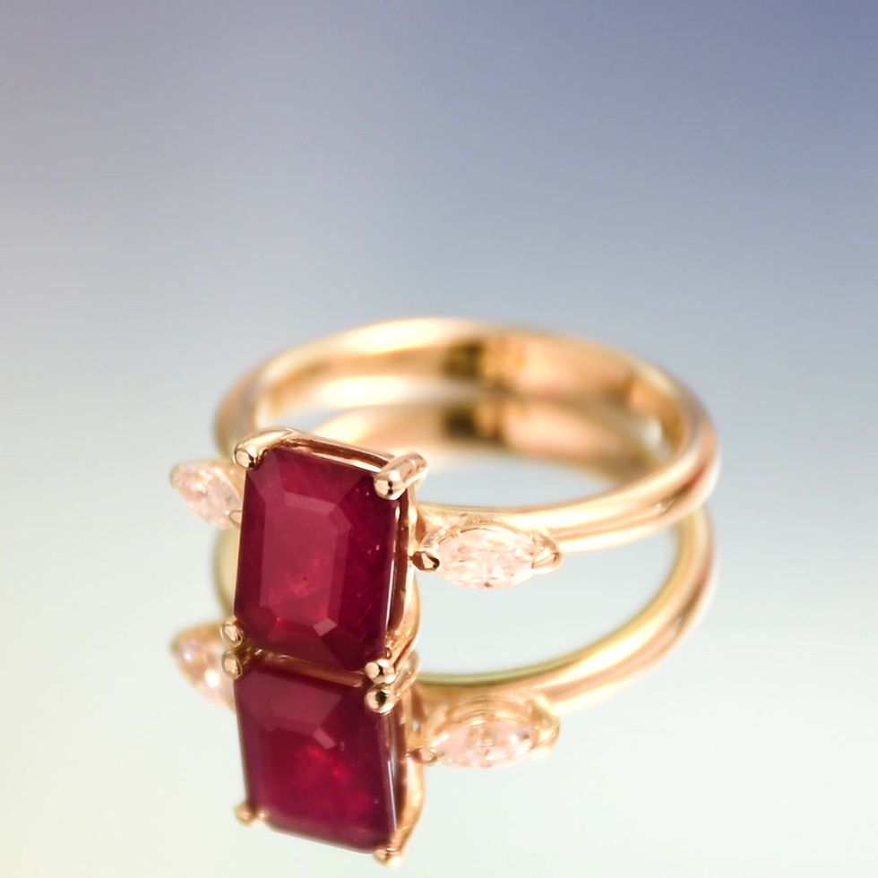 תמונה ממוזערת: טבעת זהב משובצת רובי ומויסונייט