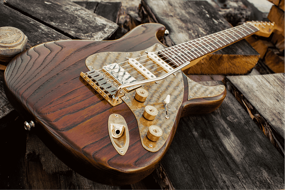 Wooden Paoletti handmade electric guitar lying on an aged wooden bench