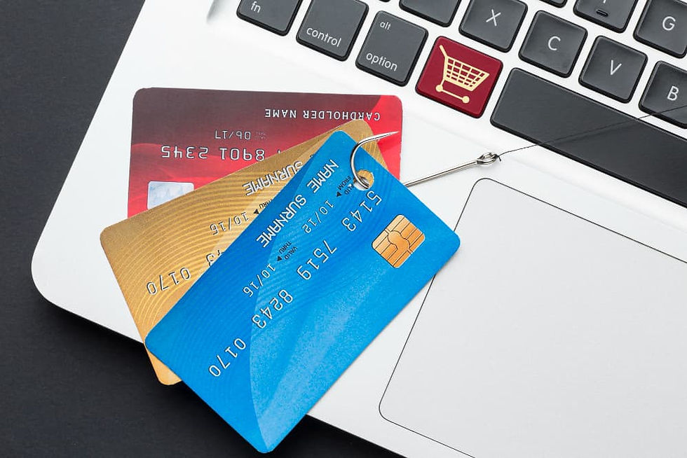Credit cards hooked to a phishing hook representing a Phishing Scam.