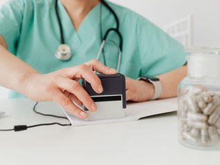 a doctor consulting with an LGBTQIA+ patient about their health needs at MR Primary Care