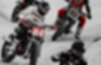Motorcyclists racing on dirt track; main biker in white "84" jersey, others in red. Focus on action and intensity, dust background.