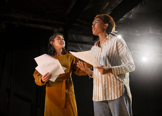 students-rehashing-theater-class.jpg