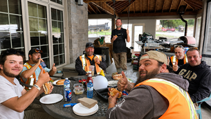 Construction workers enjoying an appreciation lunch and conversation with Shawn Rossi in Greater Sudbury.