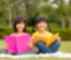 three-kids-reading-park_edited.jpg