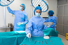 female-surgeon-surgical-uniform-taking-surgical-instruments-operating-room-young-woman-doc