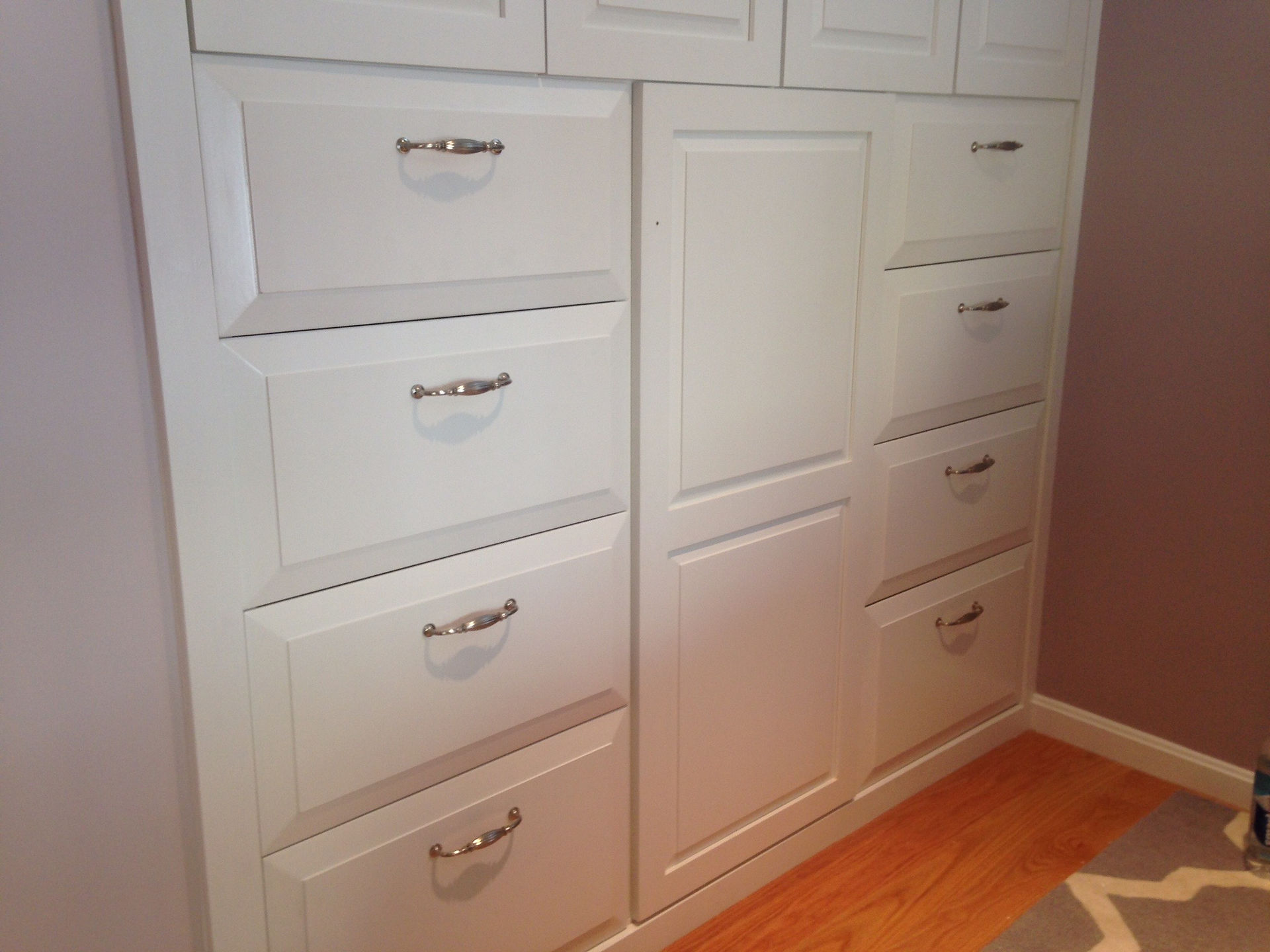 Custom drawers with hardware.