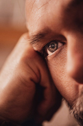 detail of a blue eye, man