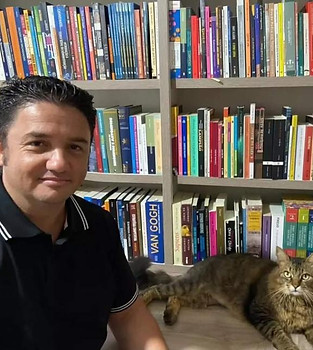 foto cleverson com gato.jpeg