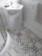 Sheet vinyl flooring fitted in small Taunton bathroom by LA Carpets & Flooring