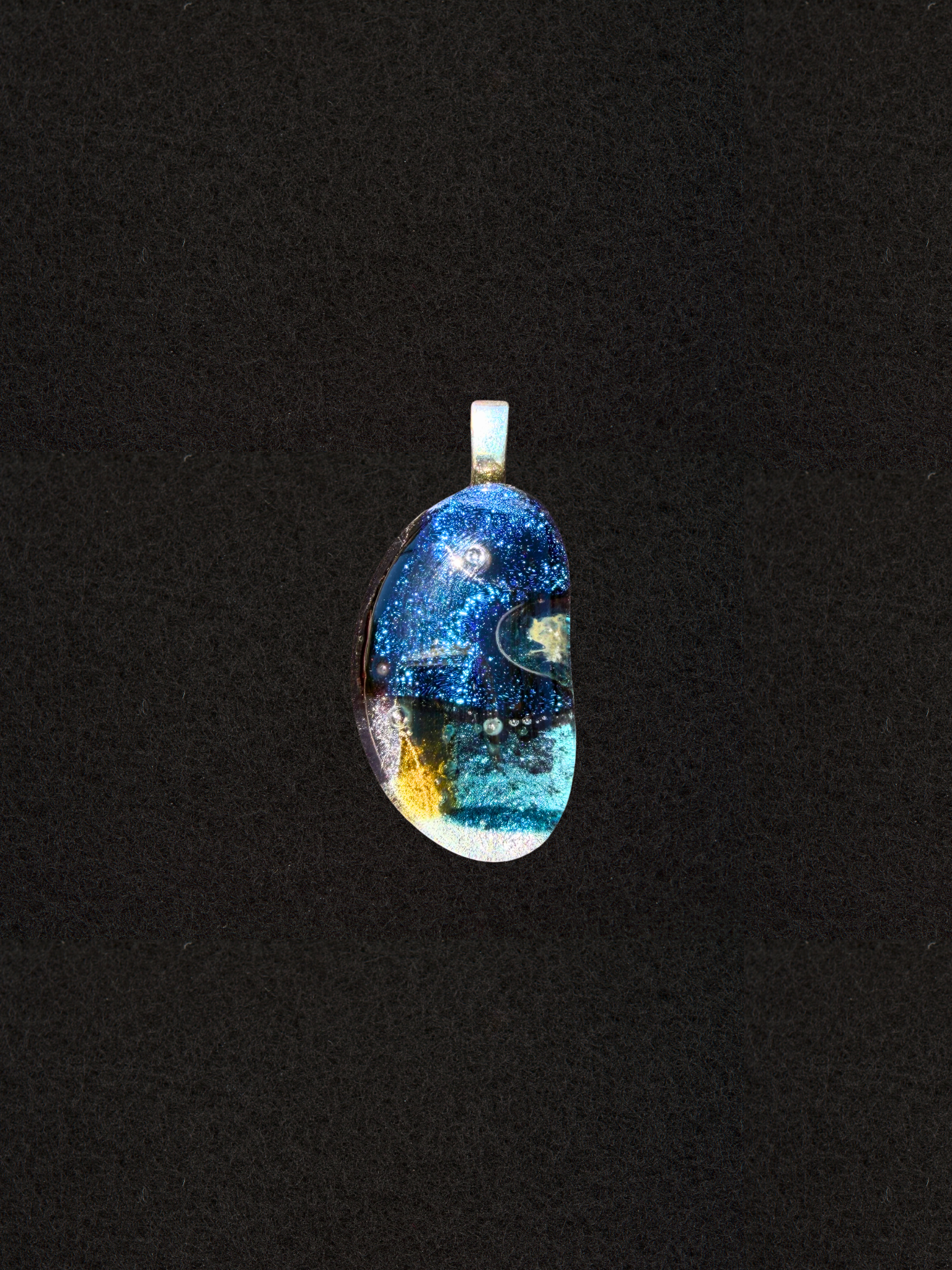 Freeform teardrop pendant necklace, deep indigo sparkle transitioning into gold and aqua tones
