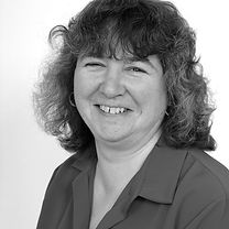 Woman Smiling in Suit