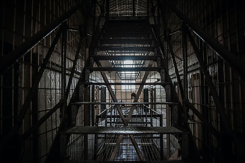 A photo of a prison, with the only way up each floor by stairs