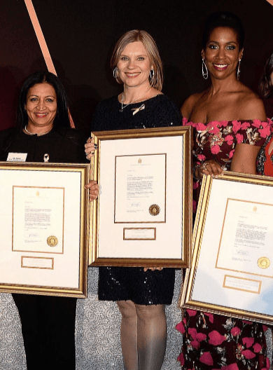 A small brown dog resting on a book
