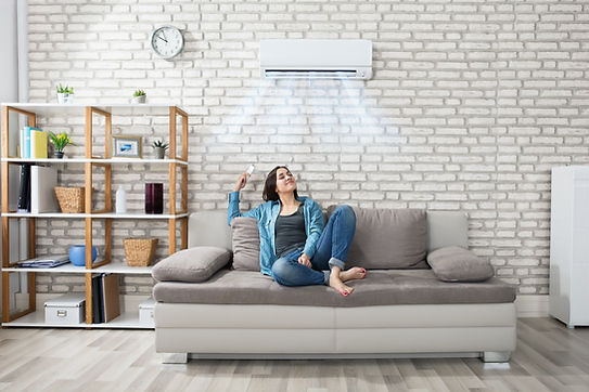 woman enjoying mini split ac_edited.jpg