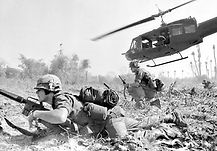 US-Army-Major-Bruce-Crandall-flies-his-UH1D-helicopter-during-the-Battle-of-Ia-Drang-Vietn