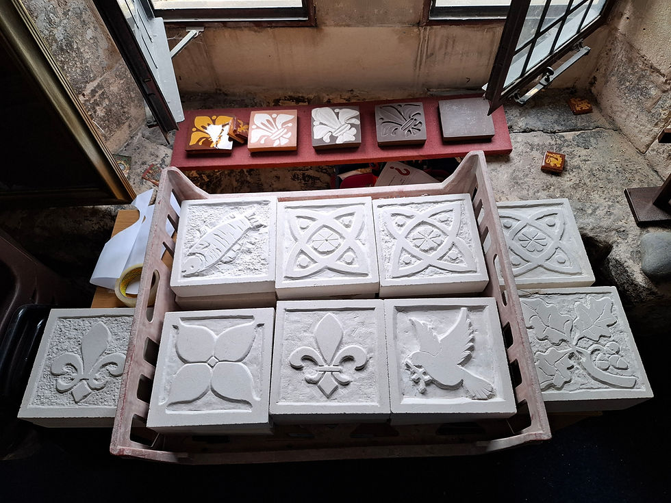 Stone carvings from community workshops.
