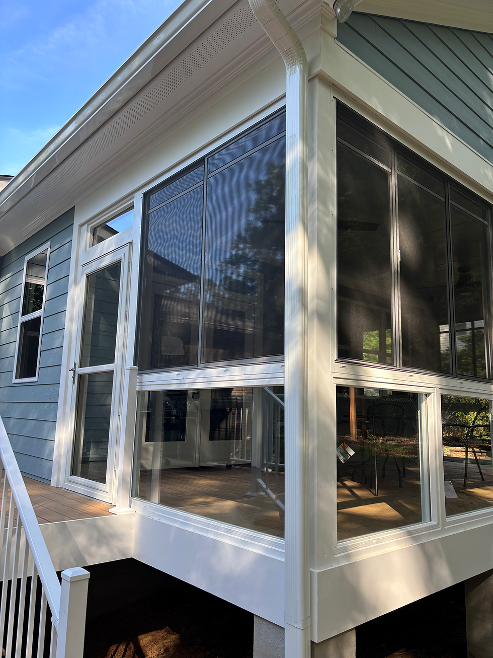 Four-season sunroom and porch enclosure for year-round comfort