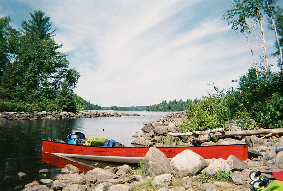 Temagami Ontario Canoe Trip, Headwaters Wilderness Program, Canoe in Lake at Portage