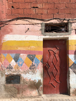 Colourful painted wall in Marrakech Medina