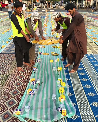 Men preparing food for Ramadan in Satwa Dubai