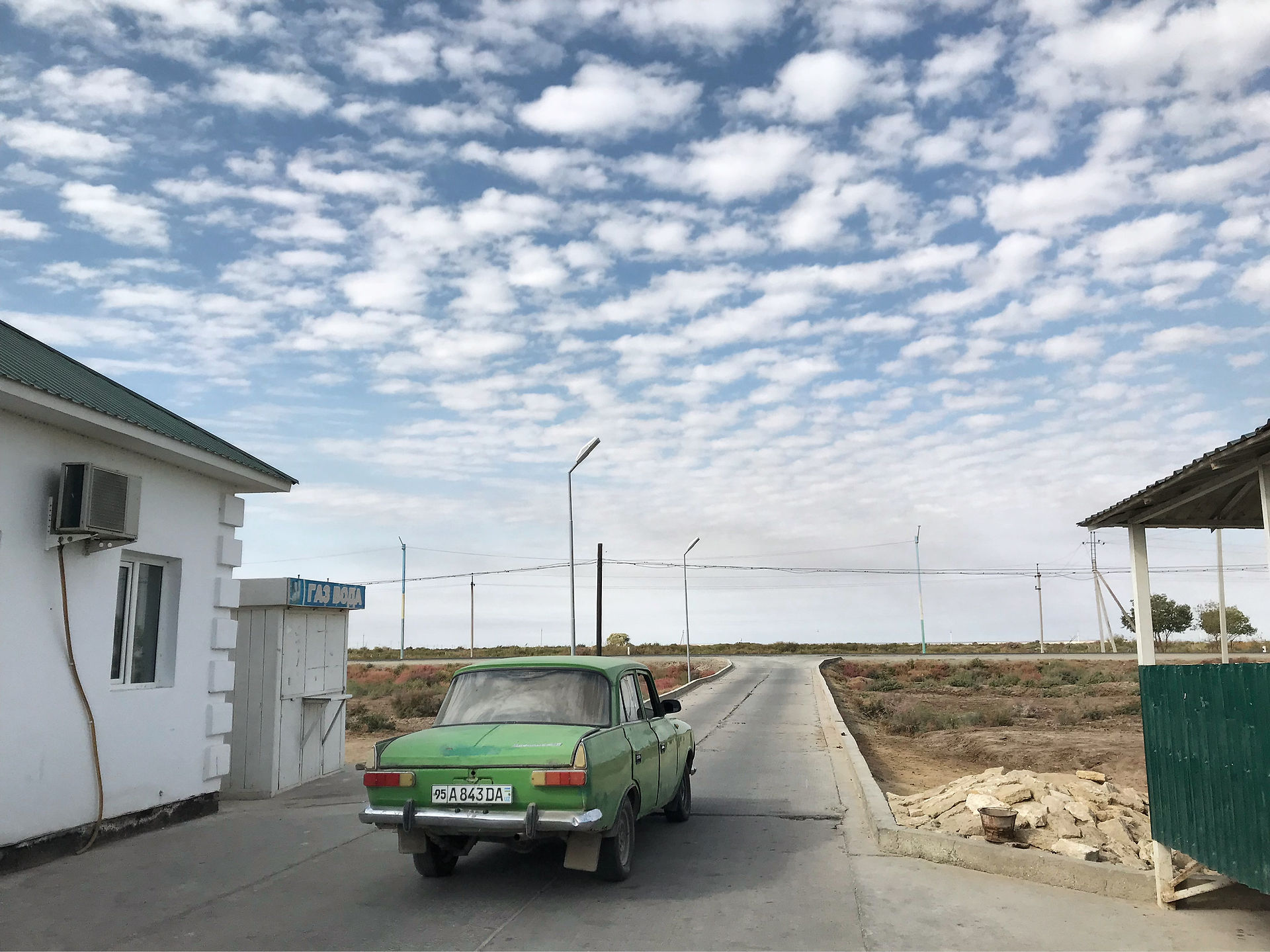 Moskvitch car at gas station in Uzbekistan