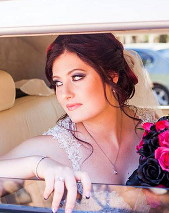 Mandurah bride Caitlin wearing a textured low bun hairstyle by Ahead of Style Hair Artistry