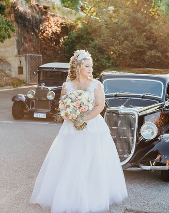 Perth bride Maddison with a romantic half-up bridal hairstyle by Ahead of Style Hair Artistry