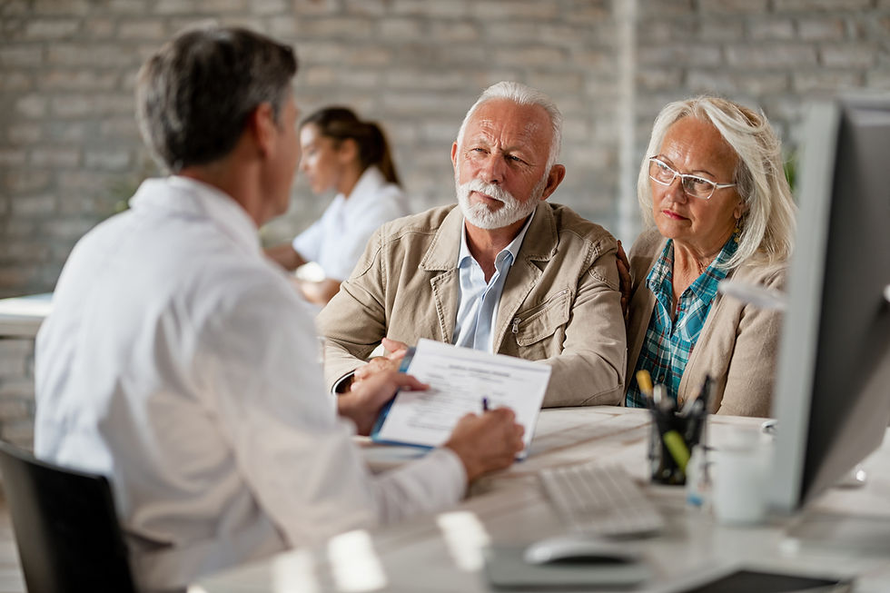 senior-couple-consulting-with-healthcare-worker-about-their-insurance-policy-while-having-
